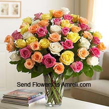 <p>36 Mixed Color Roses In A Vase</p>