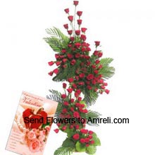 Tall Arrangement Of 150 Red Roses With A Valentine's Day Card