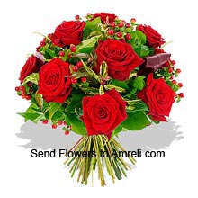 A Bunch Of 12 Red Roses With Seasonal Fillers
