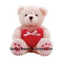 Medium Size Teddy Bear With A Heart (  Please Note That We Reserve The Right To Substitute Any Product With A Suitable Product Of Equal Value In Case Of Non Availability Of A Certain Product)