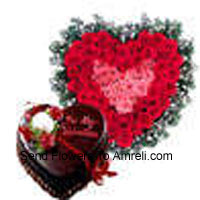 Heart Shaped Arrangement Of 50 Red Roses And A 1 Kg (2.2 Lbs) Chocolate Truffle Cake
