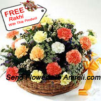 Basket Of 24 Mixed Colored Carnations With Seasonal Fillers And A Free Rakhi