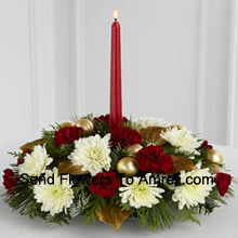 The Light & Love Holiday Centerpiece adds that special touch to any seasonal gathering. White Gerberas and burgundy mini carnations are accented with lush holiday greens  gorgeously arranged around a burgundy taper candle, to create a warm wish for a perfect holiday season. (Please Note That We Reserve The Right To Substitute Any Product With A Suitable Product Of Equal Value In Case Of Non-Availability Of A Certain Product)