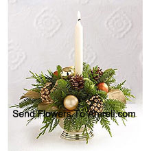 Wish all of those faces at your holiday feast a good night, glowing with seasonal dreams, with this gorgeous centerpiece perfectly accenting your table. A lovely mix of holiday greens are beautifully decorated with Assorted Flowers and a white taper candle setting the perfect mood and seasonal glow (Please Note That We Reserve The Right To Substitute Any Product With A Suitable Product Of Equal Value In Case Of Non-Availability Of A Certain Product)